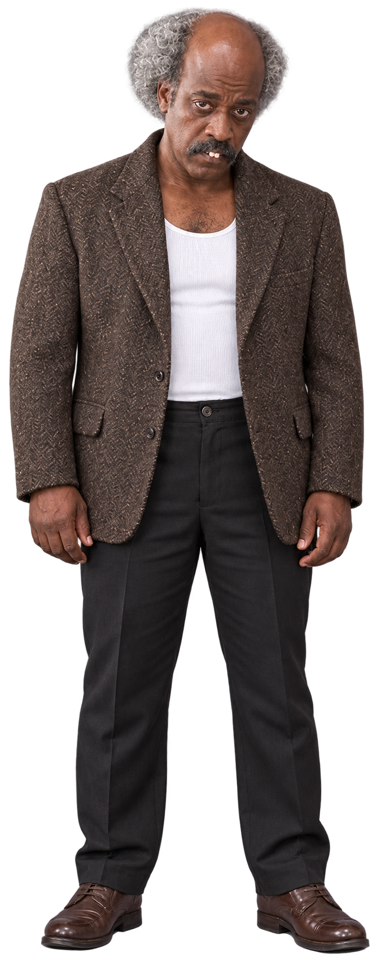 Bram Barlow standing: brown tweed blazer over a white tank top, black trousers and brown shoes.
